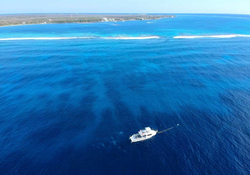 Aerial view of the dive boat over the reef